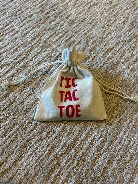 Tic Tac Toe Travel Game Bag in Cream with Red Text
